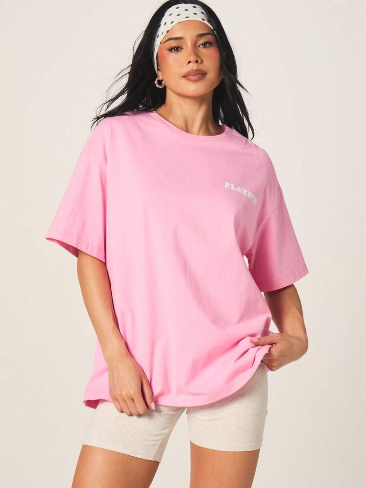 Missguided x Playboy T-shirt graphique à col ras du cou oversize à manches courtes avec grand logo imprimé au dos. Top casual streetwear