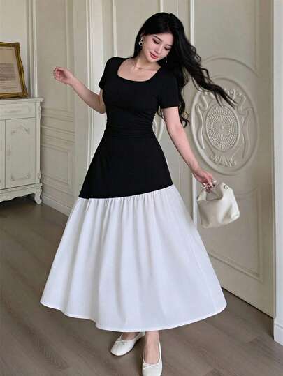 Reset Phase Summer Teen Girl Fitted Dress Black Upper Part Features Short Sleeves, While The Hem Is A Flowing Ivory Ruffled Hem. It Has A Classic Square Neckline And A Slightly Tapered Waist Design, Made With Lightweight Fabric For All-Day Comfortable Wear. Suitable For School Events, Weekend Outings, Or Casual Parties