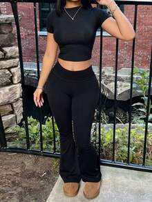 INAWLY Solva Women's Solid Color Round Neck Short Sleeve T-Shirt And Flare Pants Casual 2-Piece Set - Black - View 2