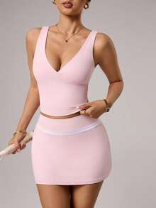 Dewbera Women's Spring/Summer Sports Set, Includes: Pink Cross V-Neck Regular Length Fitted Sports Top, Contrast Waistband A-Line Sports Skirt With Shorts Lining And Pockets, Suitable For Casual Wear, Running, Yoga, Gym, Tennis, Golf - Pink - View 4