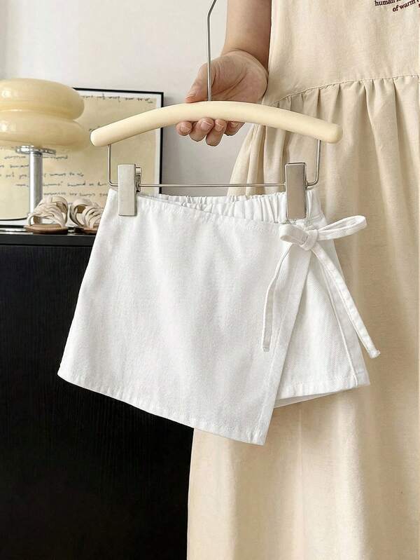 Young Girl Summer Boho Casual Soft Cute Cotton White Wrap Tie Casual Denim Skirts Shorts Spring Summer,For Kids Girls Spring/Summer Dailywear Outfits,Girls Streetwear Outfits,Beach Vacation Outfits For Girls ,Girls Summer Boho Outfits,Casual Clothes For Girls ,Elegant Shorts For Girls ,Toddler Shorts ,4-Year-Old Girls Shorts ,Summer Shorts  ,Casual Shorts ,Skirts Shorts
