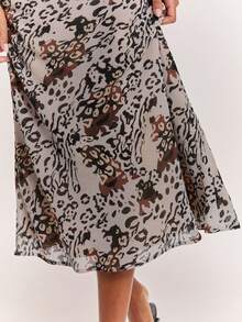 SHEIN BAE 春夏节日派对狂欢豹纹低腰中长裙，时尚街头风，性感迷你裙，夜店迷你裙，外出迷你裙，音乐节，狂欢派对，豹纹迷你裙，Y2K迷你裙，复古迷你裙 - 杏色 - 查看 7