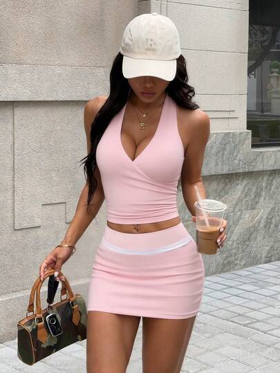 Dewbera Women's Spring/Summer Sports Set, Includes: Pink Cross V-Neck Regular Length Fitted Sports Top, Contrast Waistband A-Line Sports Skirt With Shorts Lining And Pockets, Suitable For Casual Wear, Running, Yoga, Gym, Tennis, Golf