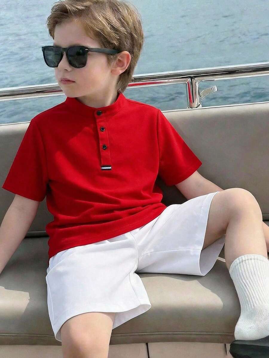 SHEIN Bộ 2 món đồ cho bé trai/thiếu niên: áo polo cổ đứng, khóa kéo nửa thân, màu trơn và quần short dệt kim.