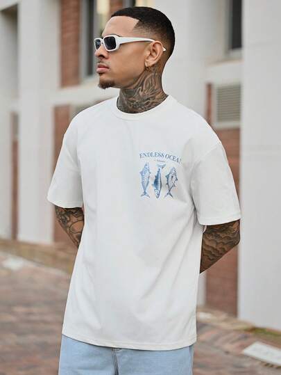 Devon Thys HIMLAND 男士休闲鱼图案印花宽松落肩圆领短袖T恤，适合户外、居家、约会、海滩等场合，白色趣味T恤，夏季，男士礼物，超大沙滩T恤，春季上衣