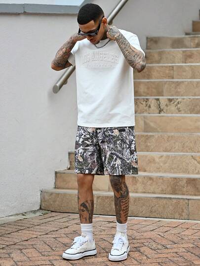 Devon Thys 标准尺寸男士 3D 压花英文标语图案 T 恤