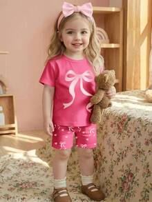 女婴休闲宽松圆领短袖T恤短裤套装（2件），甜美爱心蝴蝶结印花，适合春夏日常穿着、外出、居家、上学等场合。 - 彩色 - 查看 3
