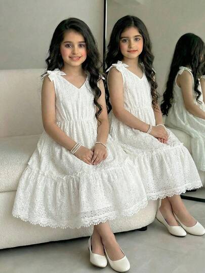 SHEIN Elladie kids 1 pieza Vestido camisola de niña con lazo de encaje bordado floral hueco blanco, cintura elástica y volantes en el bajo, estilo casual y elegante para vacaciones