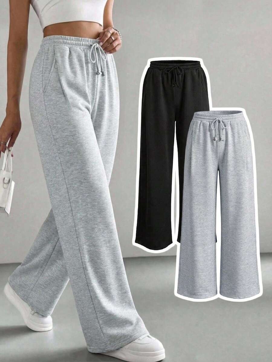 SHEIN Girlism Quần nỉ ống rộng dáng suông thoải mái có dây rút và túi dành cho nữ tuổi teen, màu xám nhạt.