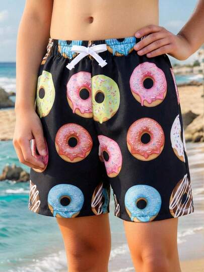 SHEIN Pantalones cortos de playa/natación holgados y versátiles con gráfico de rosquilla para niños preadolescentes
