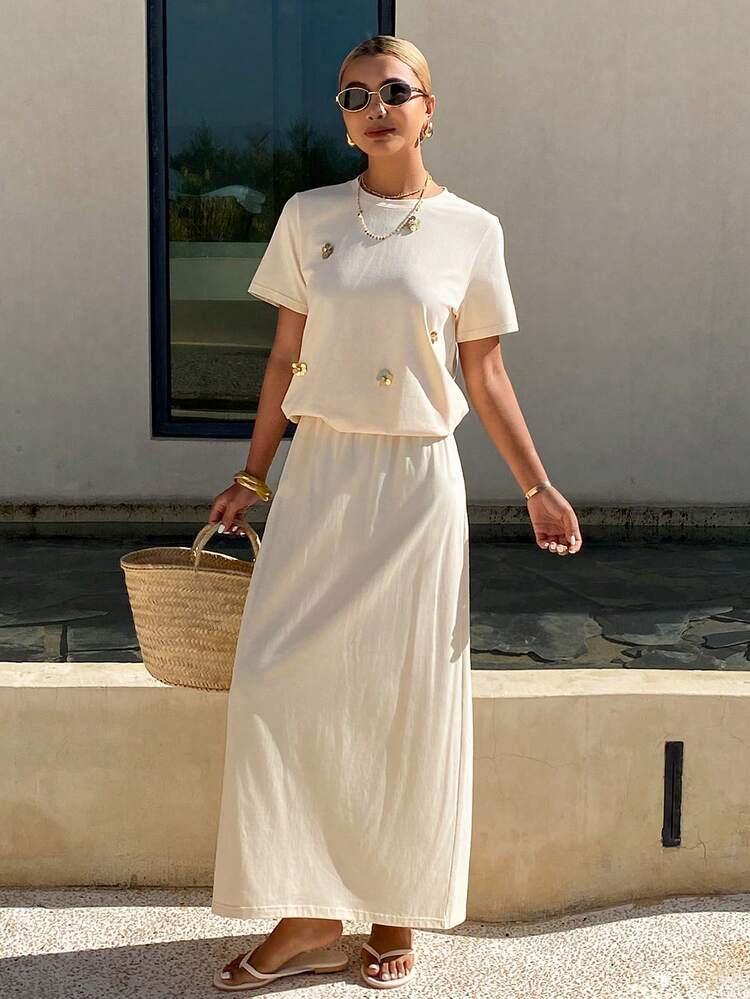 Set da 2 pezzi da donna per l'estate, stile casual da vacanza, composto da t-shirt a girocollo con paillettes in colore unito e gonna con orlo spaccato, completo da relax di colore bianco - Albicocca - Visualizzare 5