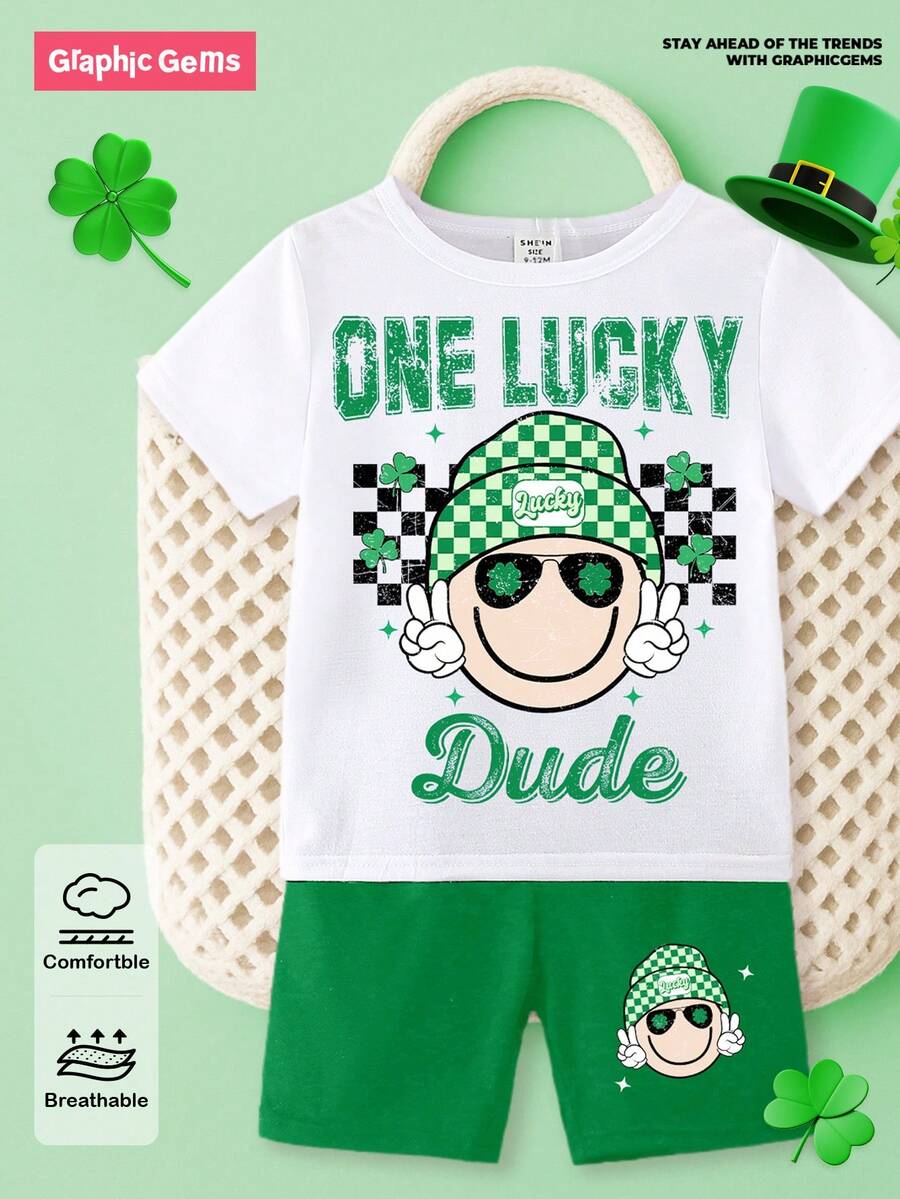 SHEIN GraphicGems Spring And Summer Toddler Boys Casual Fashion Creative Personalized Fresh Cute Kawaii Cartoon Face Green Plaid Hat, Clover, Star, Four-Leaf Clover Pattern Letter Slogan Print Casual Basic Short T-Shirt And Shorts Set, Comfortable Daily Wear Cozy Summer Styles Suitable For Spring And Summer Baby Boy Outfits