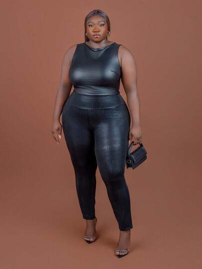 CurvyTilda Leggings de cuero sintético con estampado animal en negro para mujer de talla grande, con ajuste ceñido, alta elasticidad y efecto estilizante. Pantalones lápiz adecuados para otoño e invierno, con bolsillos, que se ajustan a la cintura y realzan las caderas. Leggings de talla grande con textura de punto elástico y bolsillo para teléfono.