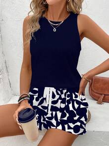 SHEIN LUNE Bộ 2 món nữ kiểu dáng thường ngày gồm áo tank top cổ tròn và quần short, họa tiết hoa xanh trắng, thích hợp cho mùa hè. - Màu xanh hải quân - Xem 4