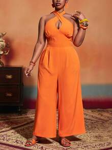 Veslaya Bộ jumpsuit nữ cỡ lớn mùa Xuân & Hè 2026, thích hợp cho các dịp lễ hội âm nhạc, lễ Phục Sinh, phong cách miền Tây, du mục, tiệc sinh nhật, lễ tốt nghiệp, đại học, sinh viên, thường ngày, dễ phối đồ, kỳ nghỉ, du thuyền, bãi biển, tắm nắng, xu hướng thời trang đường phố, khách dự đám cưới, đi làm, ăn sáng muộn, sân bay, tiệc tùng, dã ngoại, dạ hội sang trọng, vũ hội, thường ngày. Jumpsuit ống rộng ôm sát màu cam cao cấp, dây buộc cổ chéo, kiểu dáng Kingsday, jumpsuit nữ màu cam, jumpsuit cổ yếm. - trái cam - Xem 11