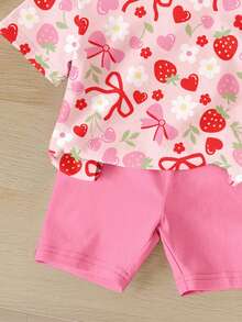 SHEIN Bộ 2 món cho bé gái, gồm áo thun ngắn tay cổ tròn dáng rộng thoải mái in hình dâu tây, trái tim, hoa và nơ, chất liệu mềm mại, thích hợp cho mùa xuân, hè, mặc hàng ngày, ở nhà, đi chơi, nghỉ lễ, lễ Phục sinh, đi nông trại, dã ngoại. - Nhiều màu - Xem 5