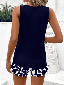 SHEIN LUNE Bộ 2 món nữ kiểu dáng thường ngày gồm áo tank top cổ tròn và quần short, họa tiết hoa xanh trắng, thích hợp cho mùa hè. - Màu xanh hải quân - Xem 2