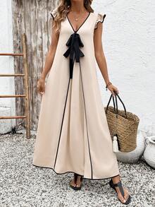 SHEIN Holidaya 女士夏季新款度假风杏色和黑色撞色蝴蝶结喇叭袖长连衣裙，采用光滑柔软的面料制成，V领撞色设计，荷叶边喇叭袖，蝴蝶结装饰，宽松舒适，适合度假和休闲场合。产品特点：女士度假撞色长连衣裙，V领蝴蝶结装饰连衣裙，荷叶边宽松连衣裙，度假百搭单品，希腊风度假连衣裙。 - 彩色 - 查看 5