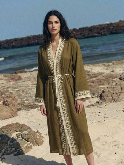 Maija Elegante cubrecuerpo de manga larga con adorno de borlas y strass, con cierre delantero