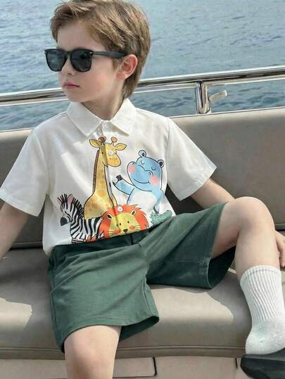 SHEIN Bộ 2 món đồ chơi cho bé trai, họa tiết hoạt hình tối giản hình voi và sư tử, gồm áo sơ mi ngắn tay và quần short, thích hợp mặc hàng ngày, đi chơi, hoạt động ngoài trời, tiệc tùng, kỳ nghỉ hè ở bãi biển, mùa xuân/hè.