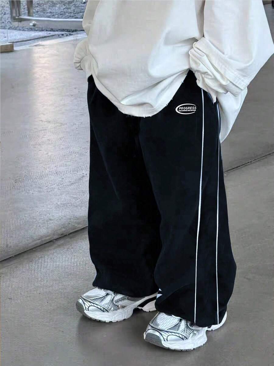 SHEIN Little Byeori 男童休闲运动裤,直筒版型,柔软舒适,带抽绳装饰,适合日常穿着、上学、户外活动、运动等多种场合,春、夏、秋、冬四季皆宜。 - 黑色 - 查看 1