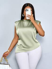 SOLERSUN Áo kiểu dáng cỡ lớn, màu trơn, chất liệu satin, có xếp ly và đệm vai, vạt áo bất đối xứng, xẻ tà có khóa kéo, eo ôm sát và thiết kế không tay. Thích hợp cho mặc thường ngày, đi làm, tụ họp, và mùa tựu trường. - màu xanh lá - Xem 4