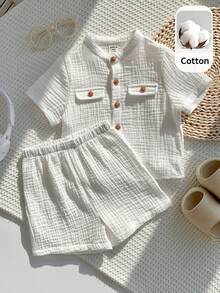 SHEIN Bộ 2 món áo sơ mi ngắn tay và quần short màu trắng mềm mại, 100% cotton, dành cho cả bé trai và bé gái, thích hợp cho mùa xuân/hè. - trắng - Xem 3