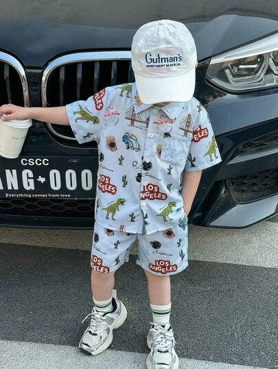 2pcs/Set Young Boys Casual Korean Style Cute Cartoon Pattern Polo Collar Short Sleeve Cardigan And Solid Color Shorts, Suitable For Outings, School, Spring/Summer