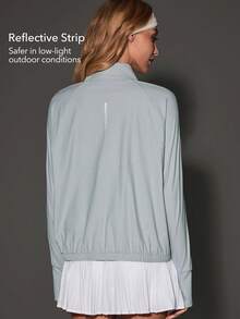 OutZeal Chaqueta protectora solar para mujer, chaqueta de gimnasio con protección UV, toque fresco, cuello alto y cremallera para exteriores - Gris - Ver 4