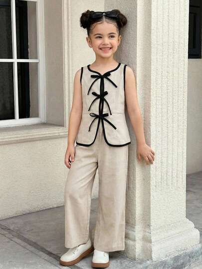 SHEIN Conjunto informal y elegante de 2 piezas de chaleco sin mangas con bloque de color y lazo, y pantalones para niña