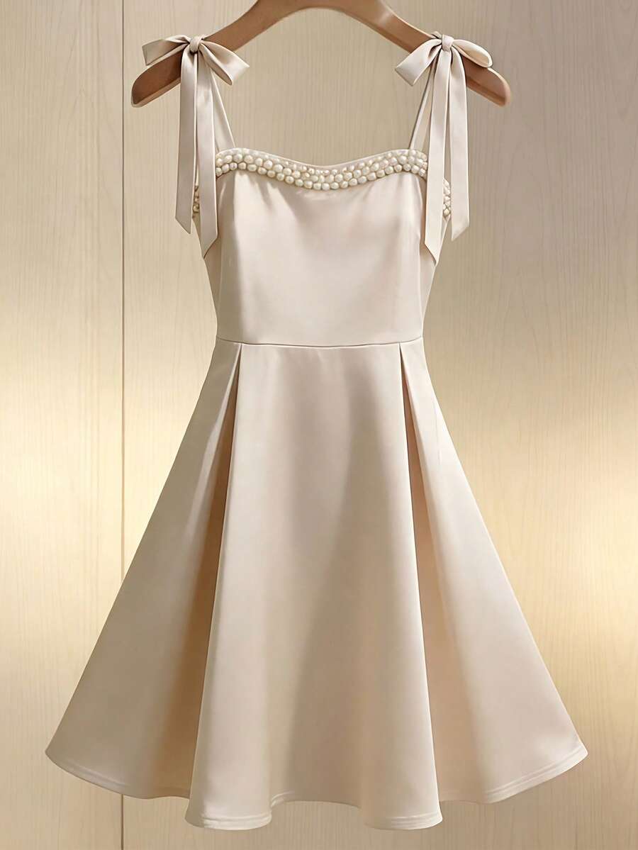 GlowEve 夏季新款度假连衣裙，缎面面料，系带珍珠装饰A字裙，杏色连衣裙，优雅女士连衣裙，优雅女士套装，女士夏季套装，优雅派对连衣裙，女士婚礼宾客礼服 - 杏色 - 查看 1