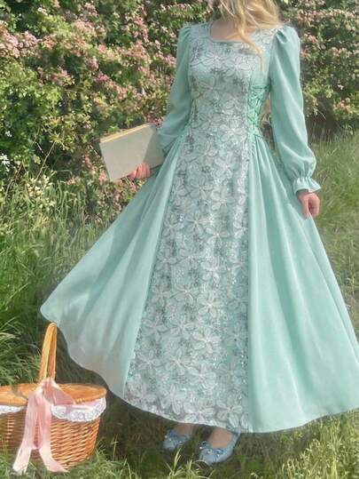 This Is A Dress For Young Girls. It Features A Square Neckline, Flared Sleeves, And An Upper Part Made Of Mesh Fabric With Embroidered Patterns. The Waist Is Tightened With Drawstrings On Both Sides; This Elegant And Stylish Dress Is Perfect For Spring And Summer.