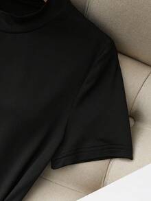GlowEve CURVE Women's Elegant French Style, Solid Black Round Neck Short Sleeve T-Shirt With Short Pleated Button Decorated Skirt, Casual Summer New 2-Piece Set, Women's Elegant Outfit, Women's Elegant Top, Casual Dress, Women's Casual Top, Spring/Summer Women's Outfit, Spring/Summer Casual Outfit, Women's 2-Piece Set - Multicolor - View 4