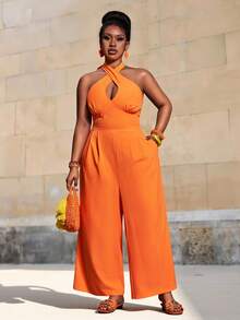 Veslaya Bộ jumpsuit nữ cỡ lớn mùa Xuân & Hè 2026, thích hợp cho các dịp lễ hội âm nhạc, lễ Phục Sinh, phong cách miền Tây, du mục, tiệc sinh nhật, lễ tốt nghiệp, đại học, sinh viên, thường ngày, dễ phối đồ, kỳ nghỉ, du thuyền, bãi biển, tắm nắng, xu hướng thời trang đường phố, khách dự đám cưới, đi làm, ăn sáng muộn, sân bay, tiệc tùng, dã ngoại, dạ hội sang trọng, vũ hội, thường ngày. Jumpsuit ống rộng ôm sát màu cam cao cấp, dây buộc cổ chéo, kiểu dáng Kingsday, jumpsuit nữ màu cam, jumpsuit cổ yếm. - trái cam - Xem 9