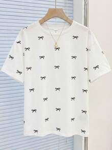 SHEIN Kids Teen Girls T-Shirts Regular Loose Fit Butterfly Print Popular T-Shirt Cute Tops Aesthetic Shirts Aesthetic Teen Girl Shirts Cute T Shirt Bow Print Shirt - Black and White - View 3