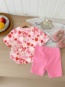 SHEIN Bộ 2 món cho bé gái, gồm áo thun ngắn tay cổ tròn dáng rộng thoải mái in hình dâu tây, trái tim, hoa và nơ, chất liệu mềm mại, thích hợp cho mùa xuân, hè, mặc hàng ngày, ở nhà, đi chơi, nghỉ lễ, lễ Phục sinh, đi nông trại, dã ngoại. - Nhiều màu - Xem 2