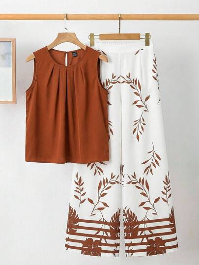 Ellevyn Nieuwe elegante damesset bestaande uit een effen top met plooien en een wijde broek, geschikt voor dagelijks gebruik en vakantie.