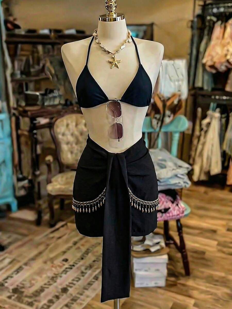 Breezaya تنورة قصيرة ضيقة للنساء بتصميم خصر عالي، مزينة بالخرز الخشبي والشراريب والزهور والرقعات، بنسيج ملمس أسود، مناسبة للإجازات والأوقات العادية الصيفية - الأسود - مشاهدة 1