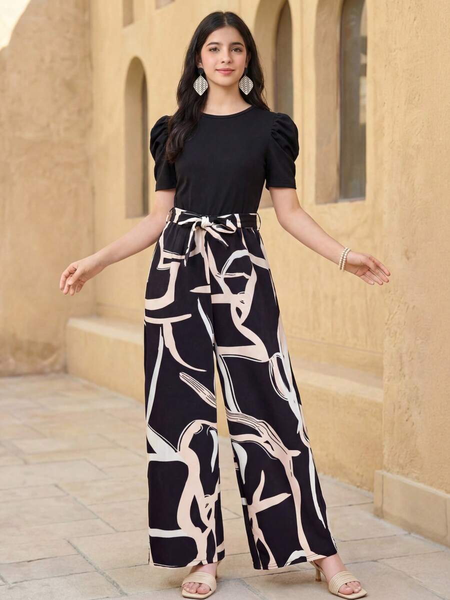 SHEIN Bộ áo liền quần in hình học đen trắng dành cho thiếu nữ tuổi teen có thắt lưng nơ, tay áo kiểu capri, ống rộng và eo co giãn, thiết kế 2 trong 1 cho kỳ nghỉ và giải trí - Đen và trắng - Xem 1