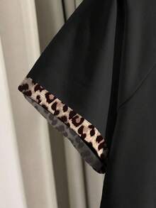 Resyla Bộ áo thun và quần short nữ cỡ lớn mùa hè mới, thiết kế họa tiết da báo cổ điển, bộ đồ thể thao ngoài trời thanh lịch và thoải mái. - màu đen - Xem 4