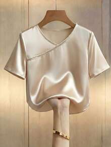 Franclia Damen elegante Satin Champagner Gold Kurzarm Bluse, locker geschnittenes asymmetrisches Perlen Dekor schickes Lässig Top - Champagnerfarben - Übersicht 3