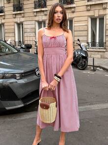 Pariaura 2026春秋新款复古格子蝴蝶结高腰修身吊带连衣裙，复古法式优雅连衣裙，宽松后背设计，红色格子新款美式复古格子蝴蝶结吊带高腰连衣裙，度假少女风，女士春秋连衣裙 - 粉色 - 查看 5