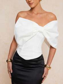 Lumalex Áo croptop nữ màu trắng không dây, ôm eo, thiết kế nơ lớn kiểu cổ điển, phong cách lãng mạn và thanh lịch cho mùa Xuân/Hè, thích hợp cho các bữa tiệc. Áo có phần thân trên mềm mại, phần eo kiểu corset, ôm sát cơ thể và tạo dáng thanh lịch nữ tính. Thích hợp cho mùa Xuân/Hè, phong cách lãng mạn thanh lịch. - trắng - Xem 7