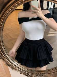 Celisse Camiseta ajustada de mujer con hombros descubiertos, lazo y acanalada, en negro y blanco - Blanco - Ver 1