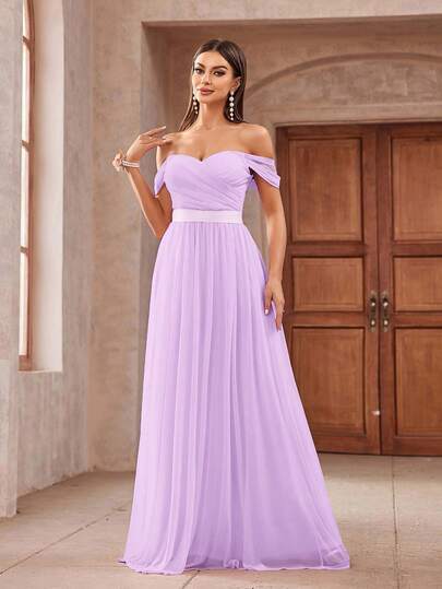 Aureia Elegante vestido de dama de honor romántico de tul metalizado con hombros descubiertos, volante, lazo en la cintura y fluido volumen de tul