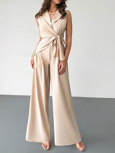 RiviMae 2026 Spring/Summer New Elegant Minimalist High-End Casual Fashion Commute Workwear Daily Sleeveless Blazer Collar Design Side Tie Waist Asymmetrical Hem Slim Fit Jumpsuit For Women