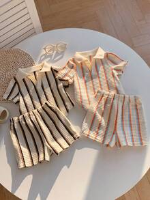 SHEIN 4件套男女通用婴儿服装，可爱学院风条纹拼接短袖Polo衫和短裤套装，适合生日派对、锐舞派对、晚宴、演出、婚礼、宝宝满月、洗礼、一周岁生日庆祝、婚礼宾客、迎婴派对、复活节等场合。 - 彩色 - 查看 7