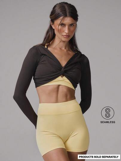 Musera Sport Sujetador deportivo sin costuras con nudo delantero, cuello con lazo, manga larga, para actividades, entrenamiento, gimnasio, pilates, fitness y uso diario casual, color banana pudding