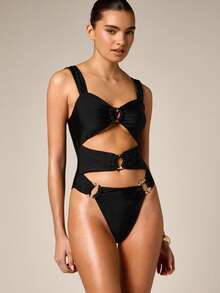 AiiRZ Traje de baño de una pieza con diseño de monokini, detalles de anillo con cortes y tirantes cruzados en la espalda para vacaciones en la playa y piscina en verano - Negro - Ver 1