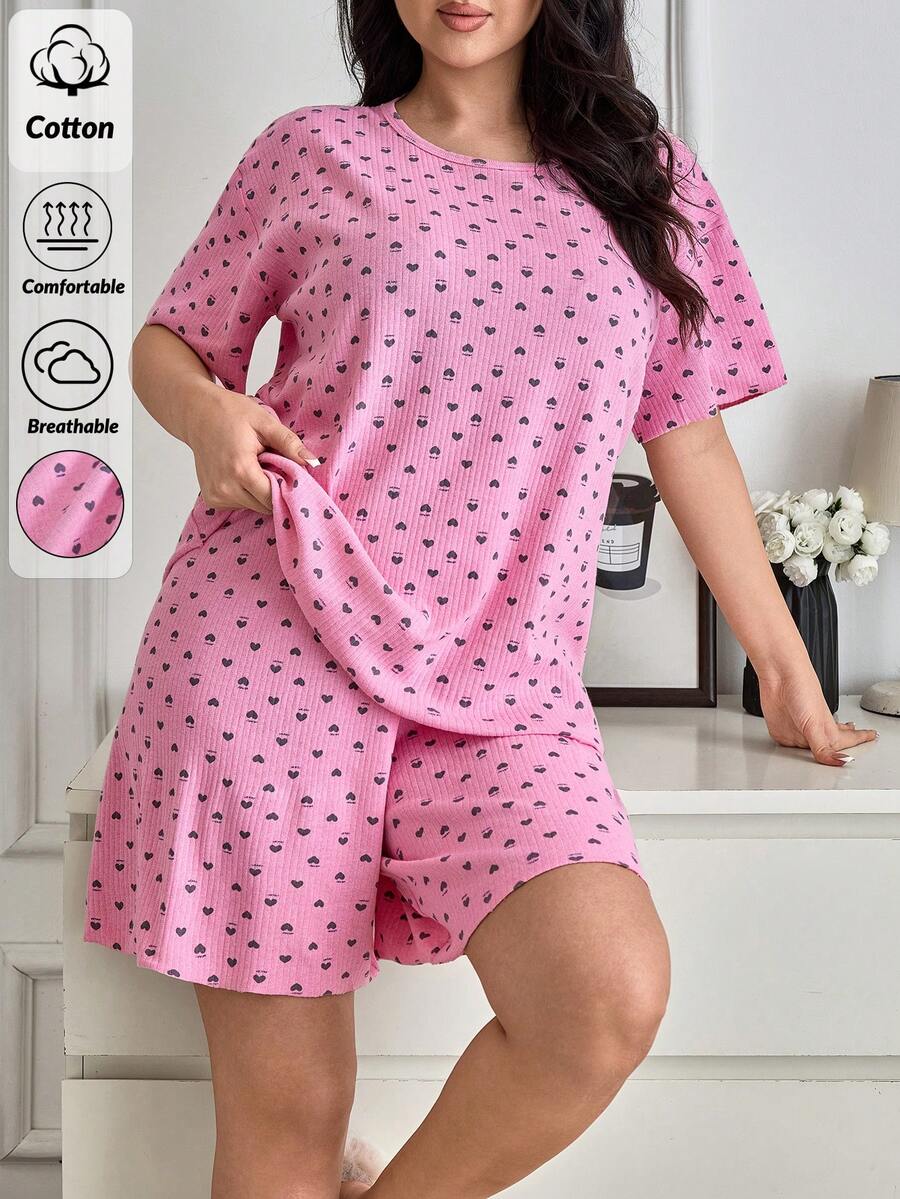 SHEIN Bộ đồ ngủ nữ cỡ lớn gồm 2 món, chất liệu cotton, dệt kim gân, màu hồng phối tương phản, họa tiết trái tim, cổ tròn, tay ngắn và quần short, thoải mái, thích hợp mặc ở nhà. - Hồng - Xem 1